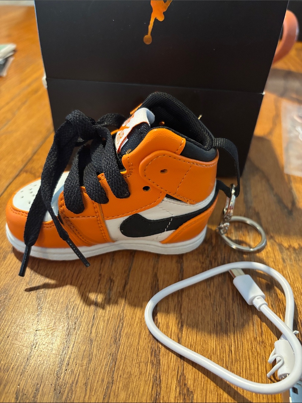 Nike Orange and Black Mini Sneaker Power Bank Keychain